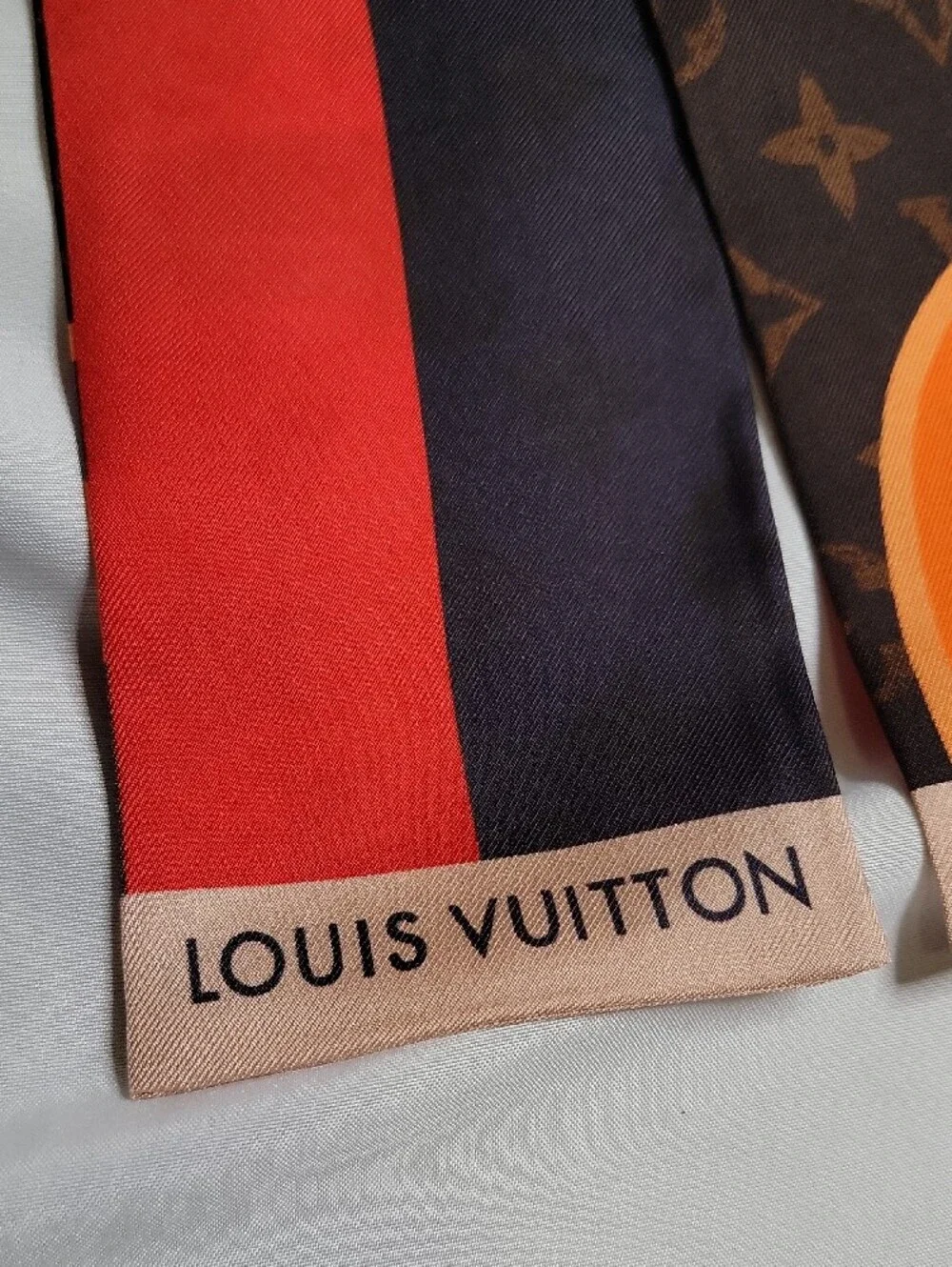 Louis Vuitton Brown Red & Orange Monogram Twilly